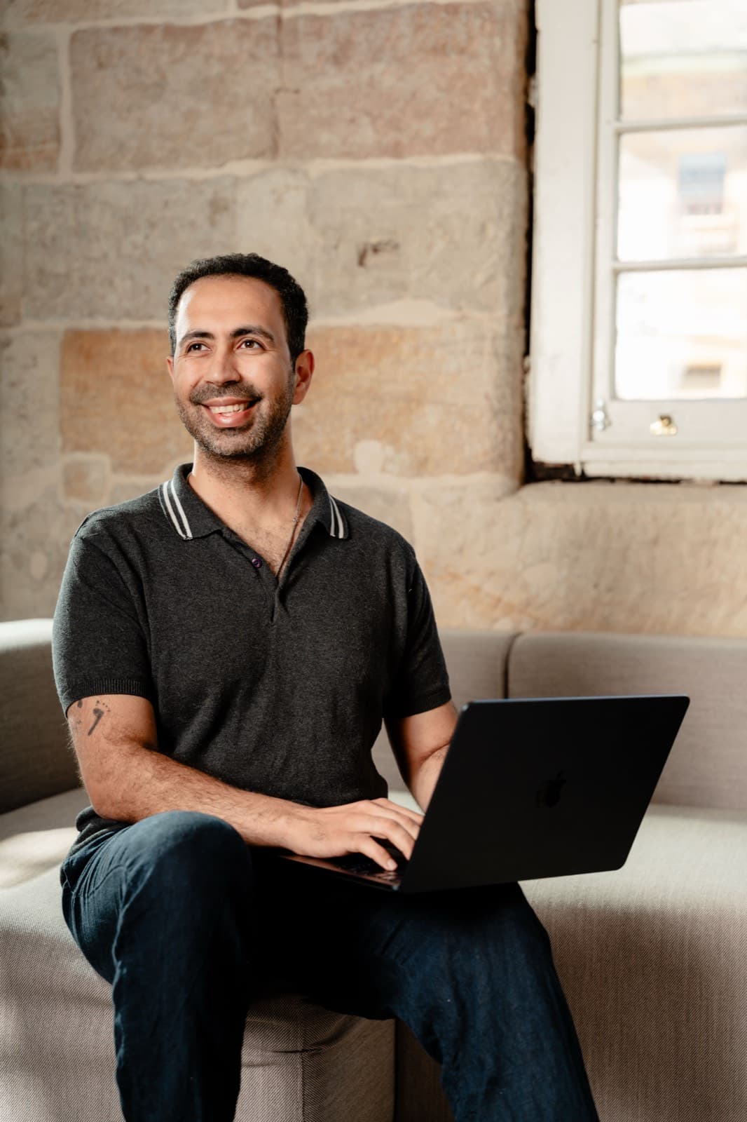 Farhad Malegam, founder of Dream Websites, working in Sydney