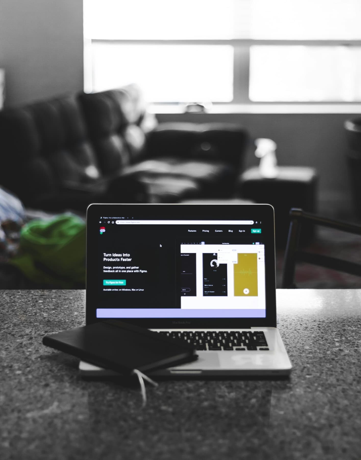 Laptop on a desk showing a modern website design
